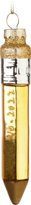 A glass Christmas ornament shaped like a pencil, with gold glitter and a metallic finish.
