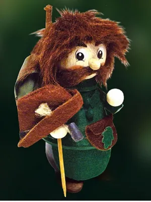 Förstermännel hat struppigen braunen Bart und Haare, große, ausdrucksstarke Augen und Stupsnase.
