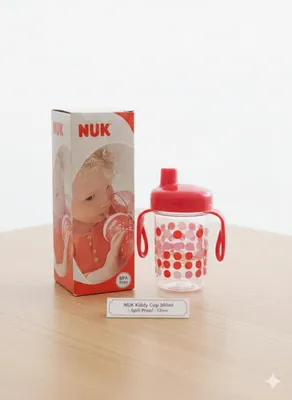 Immagine prodotto di Tazza NUK Kiddy con motivo a giraffa - infrangibile e a prova di perdite, Immagine generata dall'IA
