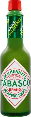 A bottle of Tabasco Jalapeno sauce against a white background.