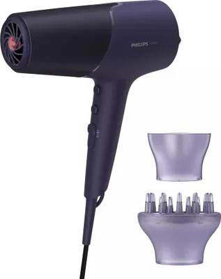 A purple Philips hair dryer with two attachments on a white background.