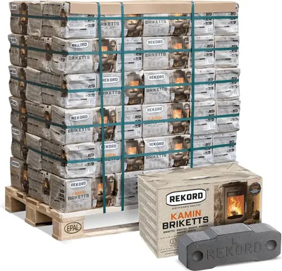 A large pallet of briquette packages and a single box with briquettes in the foreground.