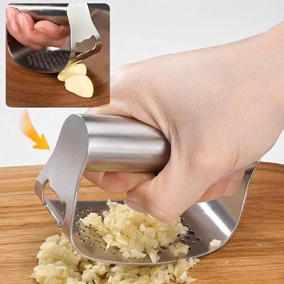 Produktbild von Edelstahl Knoflickpresse mit Dunschneider und Reinigungsbürste