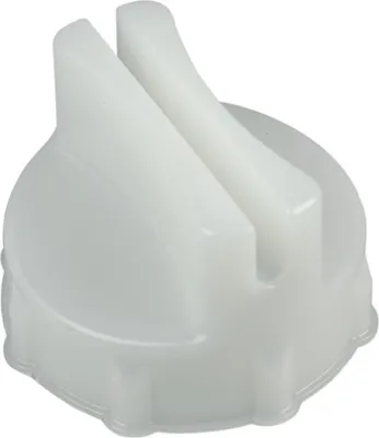 A white plastic tool for changing a light bulb in an oven.