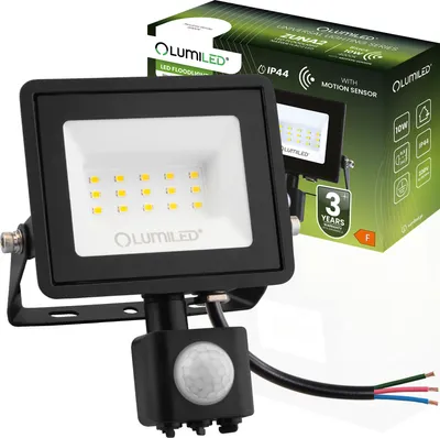 A black LED floodlight with a motion sensor is shown in front of its packaging.