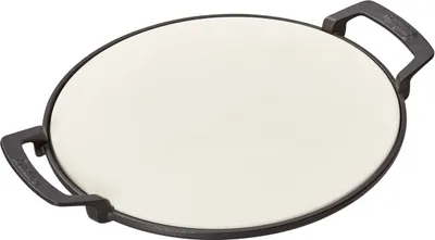 A round pizza stone with black handles on a white background.