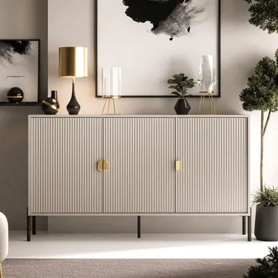 A modern sideboard with decorative elements in a room setting.