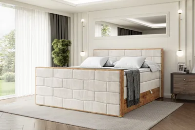 A bedroom scene with a bed as the focal point.