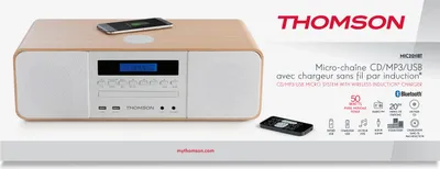 A Thomson micro-system with a smartphone charging on top, presented on a white surface with marketing text and icons.