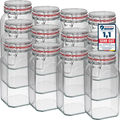 A group of glass jars with red-lined clamp lids are arranged in rows on a white background.