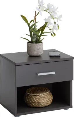 A gray nightstand with a drawer and an open shelf, featuring a potted orchid and a smartphone on top.