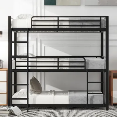 A triple bunk bed with black metal frame and white bedding is shown in a room with white walls and a patterned rug.