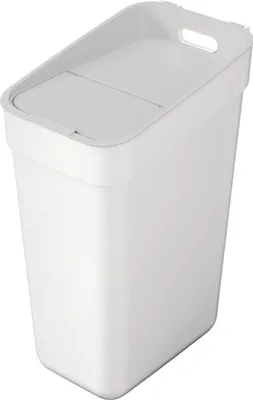 A white trash can with a lid.