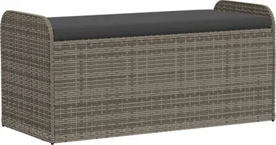 A product shot of a gray poly rattan storage bench with a dark gray cushion.