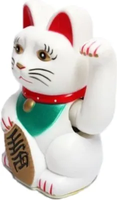 A white lucky cat figurine with red ears and collar, and a green bib.