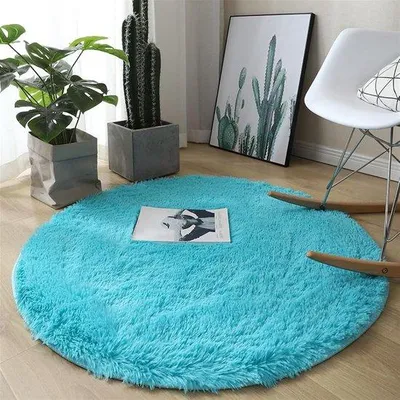 Imagen del producto de Alfombra redonda de felpa Unyqoos® de 60x60 cm: suave y esponjosa, fabricada con poliéster de felpa y una capa de espuma, con antideslizantes, ideal para dormitorios y entradas, color azul