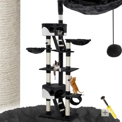 A multi-level cat tree with several platforms, scratching posts, and hanging toys, featuring two cats interacting with the structure.