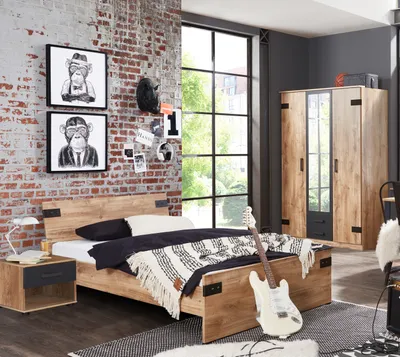 A bedroom with a bed, wardrobe, and decorative items, styled for a teenager.