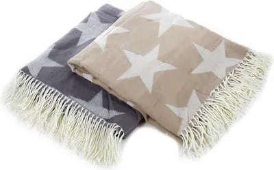 Two folded blankets with star patterns, one gray and one beige, with white fringe.