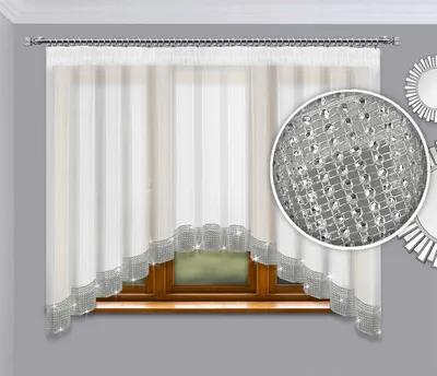 A window with white curtains decorated with silver trim and rhinestones.