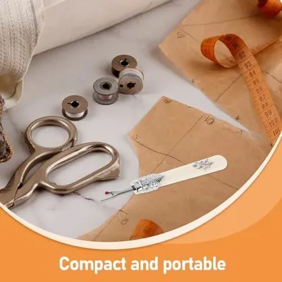 Produktbild von Nahttrenner aus Kunststoff und Metall mit ergonomischem Design für professionelle Näharbeiten und Stickprojekte im Vintage-Stil