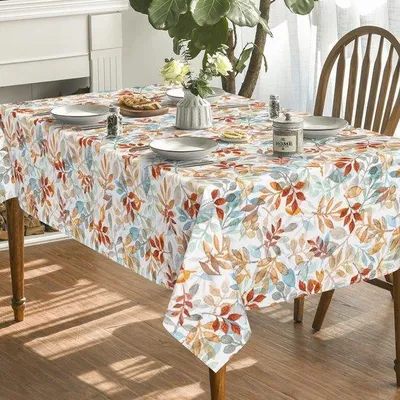 Produktbild von Unyqoos® Tischdecke rechteckig 100×140 cm – blau‑orange Herbst‑Blattmuster, 100% gesponnenes Polyester, schützt vor Kratzern & Flecken, leichter Glanz