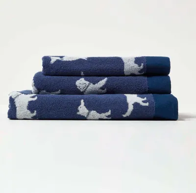 Produktbild von HOMESCAPES Frottee-Handtuch blau mit Hundemotiv - 50 x 85 cm, 100% Baumwolle