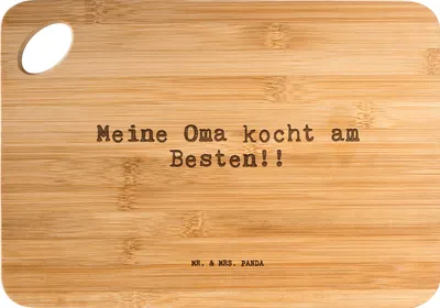 Produktbild von Mr. & Mrs. Panda Schneidebrett Meine Oma kocht am... - Transparent - Geschenk, Sprüche, Großeltern, Brett, Holzbrett, Enkel, Frühstücksbrettchen, Hackbrett, Omi