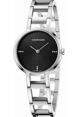 A close-up studio shot of a Calvin Klein women's watch with a black dial and silver band.