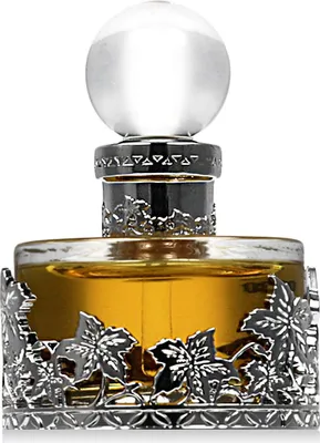 A close-up studio shot of a perfume bottle.
