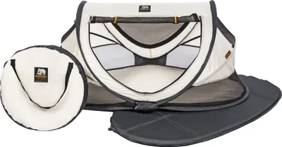 A travel crib and its accessories are laid out on a white background.