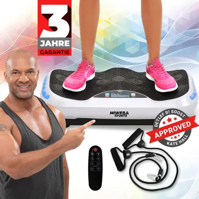 A man pointing at a white vibration plate with a person's legs on it, along with accessories.