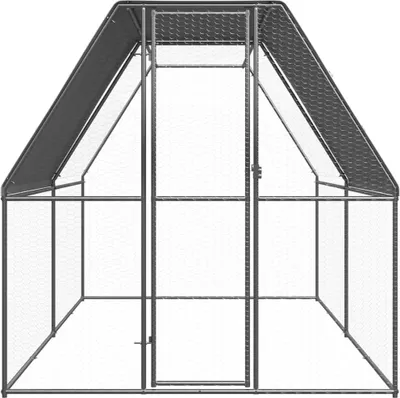 An empty outdoor chicken coop made of galvanized steel.