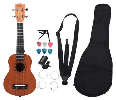 Obrázok produktu pre Súprava pre začiatočníkov s ukulele (21 palcov) z broskyňového dreva, 4 struny, vrátane ladičky, popruhu, kapodastrov, trsátok a prenosnej tašky – na cvičenie pre dospelých aj deti