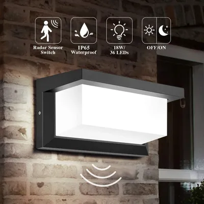 A modern black LED wall light with a white frosted diffuser is mounted on a brick wall. Icons indicating features like radar sensor, IP65 waterproof, 18W/36 LEDs, and ON/OFF are displayed above the light.