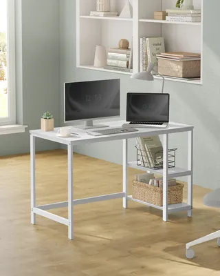 A white desk with a computer monitor and laptop is set up in a modern office or home study.