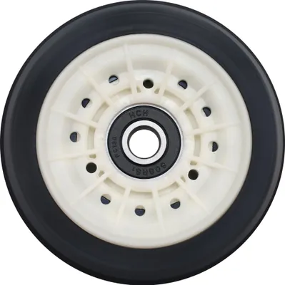 A close-up of a washing machine drum roller.