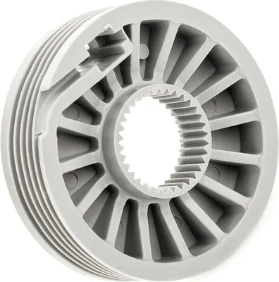 A close-up view of a pulley. The pulley is made of grey plastic and features a grooved outer edge and a toothed inner hub.