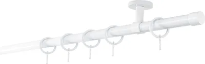 A white curtain rod with rings, mounted to a ceiling.