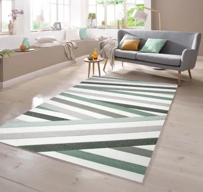 Image de Tapis design à motifs découpés, rayé, couleurs pastel (vert, crème, beige), dimensions : 80 x 300 cm