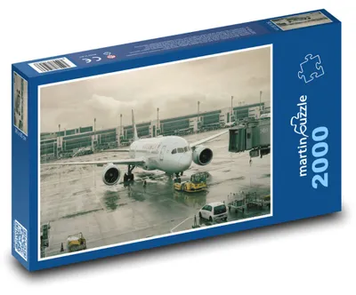 Zdjęcie produktu dla Puzzle 2000 Samolot na płycie lotniska - martinpuzzle