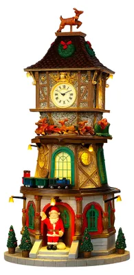 Immagine prodotto di Villaggio Natalizio Christmas Clock Tower 16x33x16 cm con Luci e Suoni