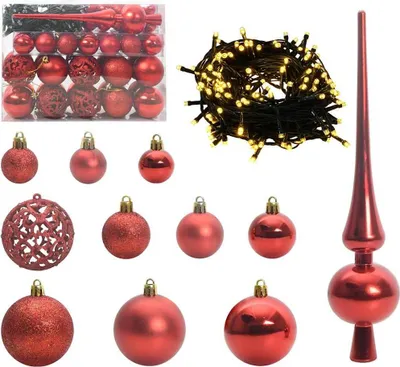 A collection of red Christmas ornaments and a tree topper, along with a string of fairy lights.