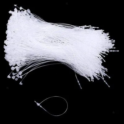 Immagine prodotto di Etichette di sicurezza in plastica, set da 1000 pezzi, etichette trasparenti e bianche per tessuti, articoli in pelle e calzature, 8,5 cm x 12,5 cm