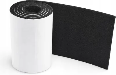 A roll of black adhesive felt with a white backing is shown on a white background.