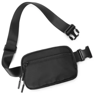 Productafbeelding van Heuptas modieus - Verstelbare riem - Duurzaam canvas - Kleine schoudertas - Compact formaat - Ideaal voor onderweg - Crossbody Tas
