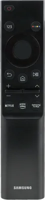 A black Samsung TV remote control is shown against a black background.