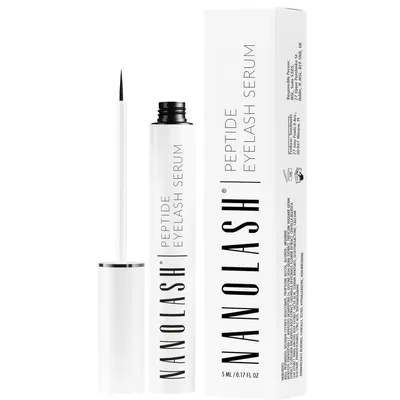 A product shot of an eyelash serum bottle and its box against a white background.