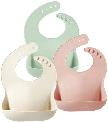 Immagine prodotto di Set di 3 bavaglini in silicone morbido Unyqoos®, con tasca raccoglitore, chiusura regolabile, 100% silicone, 4 taglie, adatti dai 6 mesi ai 6 anni, lavabili, disponibili in vari colori