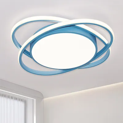 A modern blue and white ceiling light fixture with intertwined rings, mounted on a white ceiling.